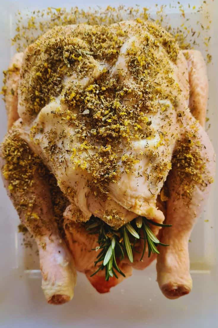 preparing traeger smoked lemon herb chicken